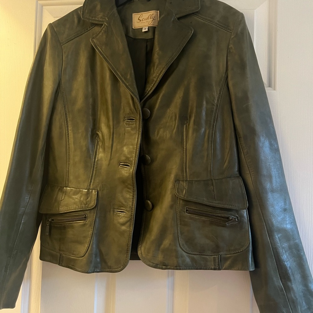 Skully leather jacket .Lined. Green leather , so soft , beautiful condition.